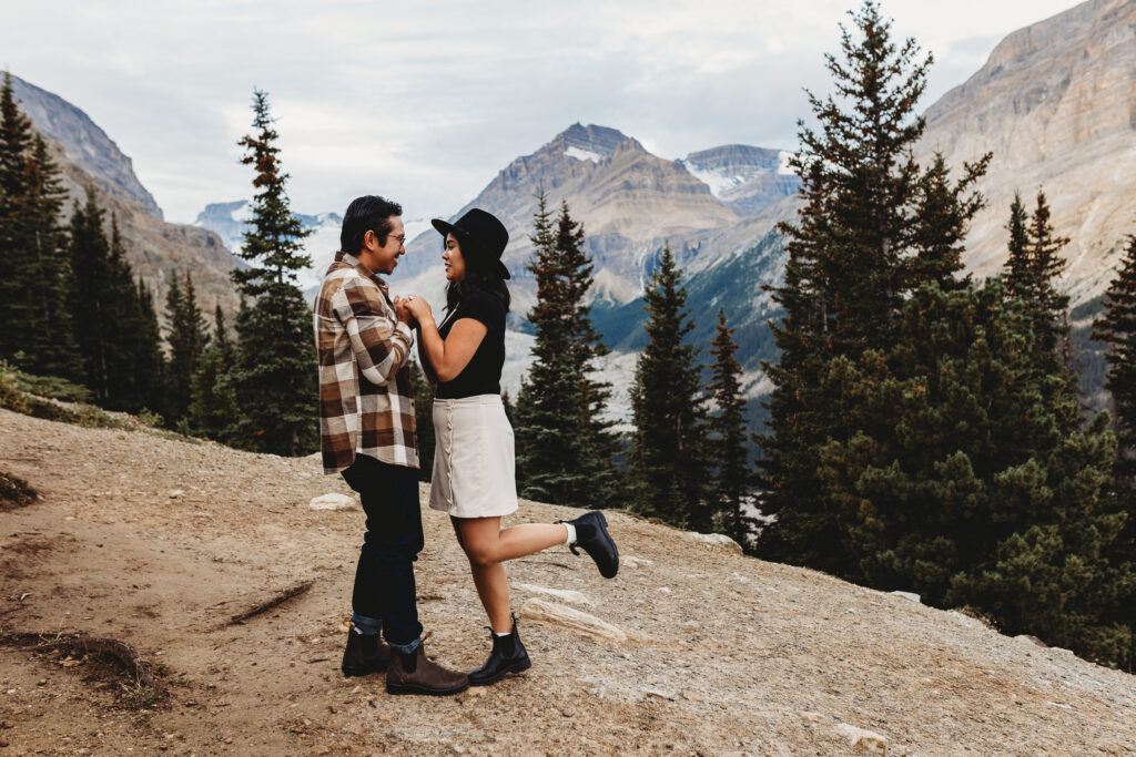 Couple hanging out together on their elopement day on Banff National Park