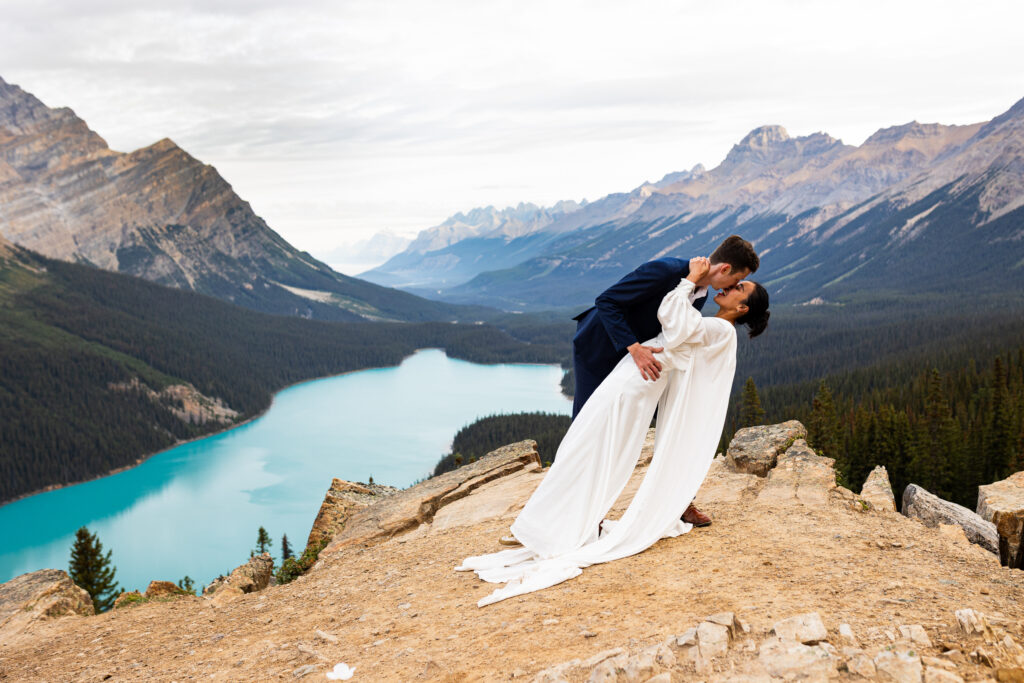 Couple share a special moment in Banff National Park at their elopement ceremony.