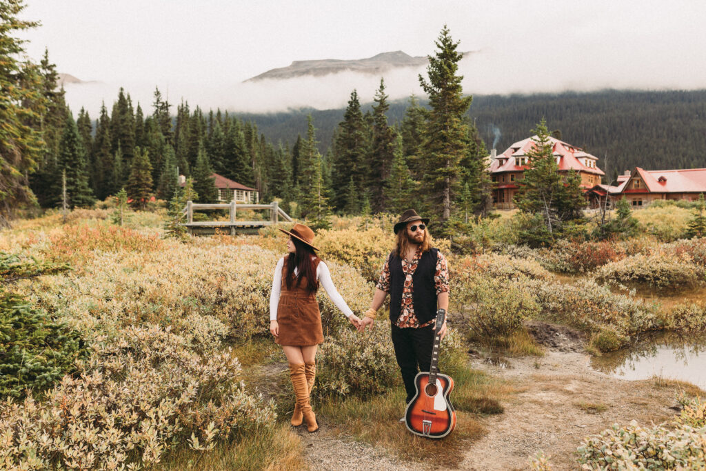 Couple chose to elope in Banff National park. they wanted to dress up in fun clothing with guitars and has to make their elopement more personal.